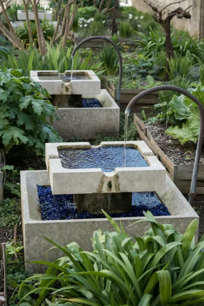 Create A Vertical Garden Irrigation System Using Repurposed Rain Gutters 1c849f
