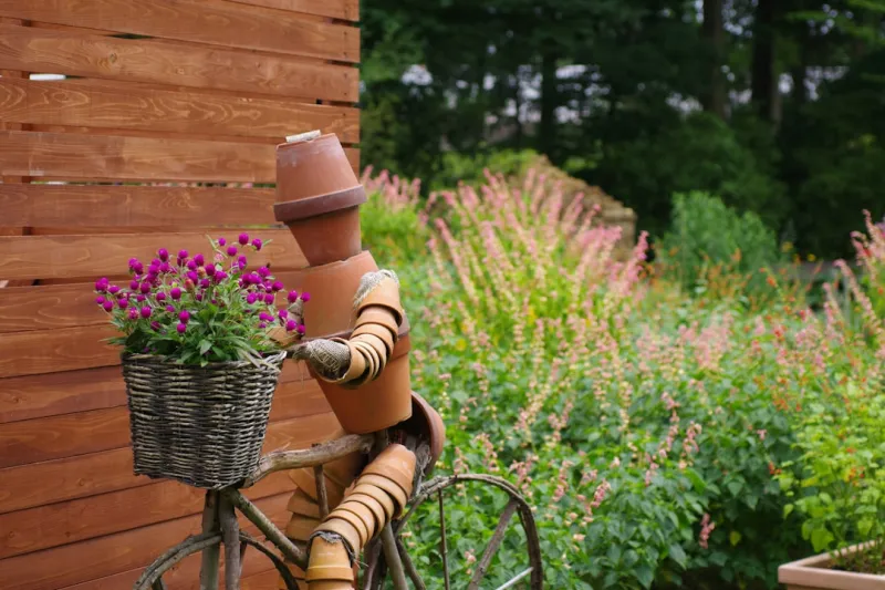Create A Vertical Garden Using Repurposed Pallet Wood And Mason Jars