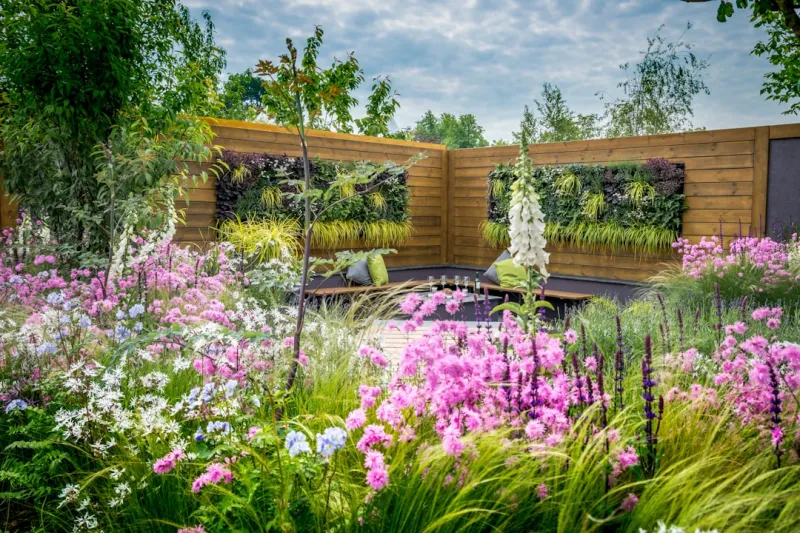 Create A Vertical Garden Using Repurposed Pallets And Decorative Planters